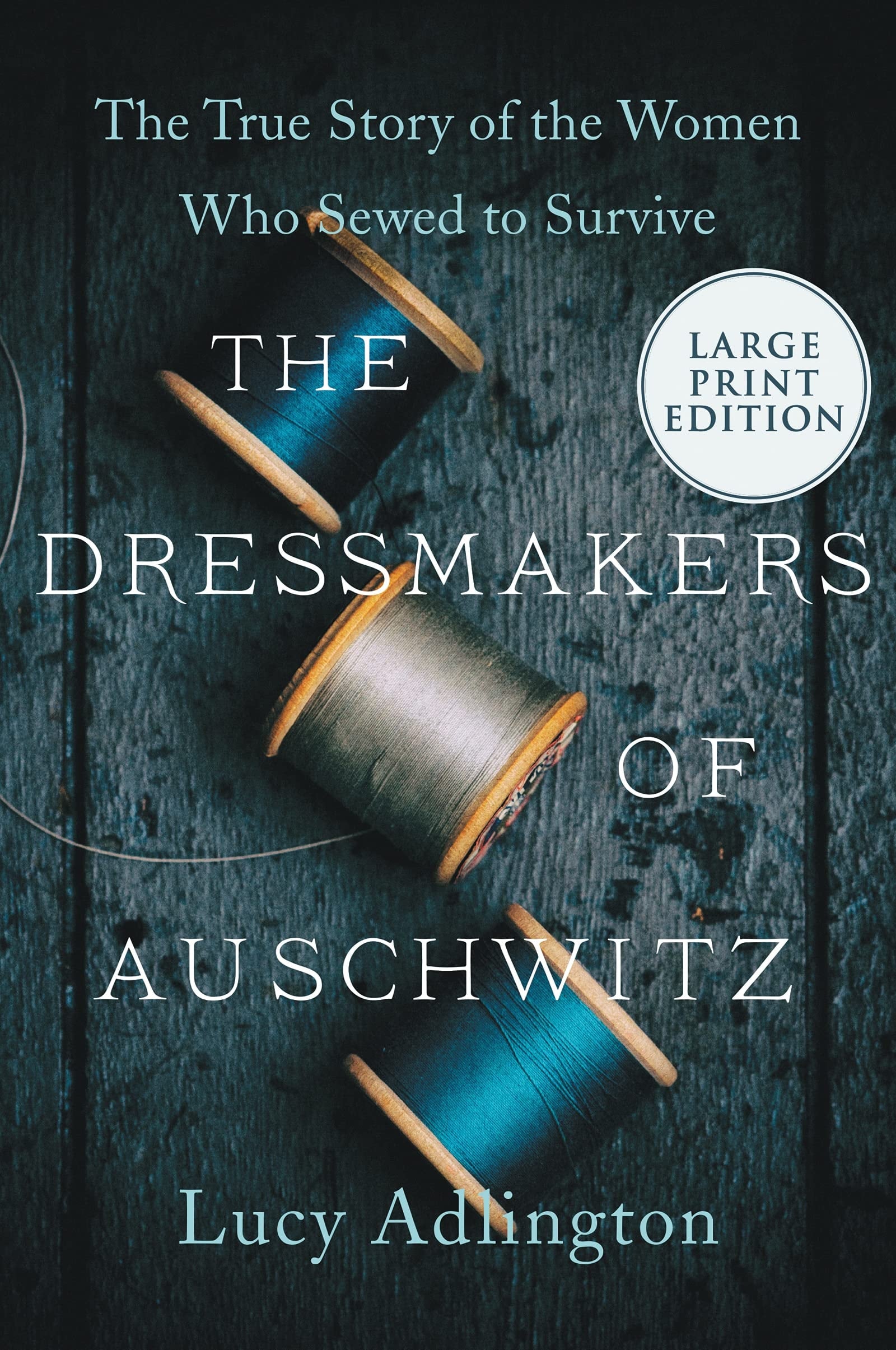 Book cover of The Dressmakers of Auschwitz: The True Story of the Women Who Sewed to Survive by Adlington, Lucy