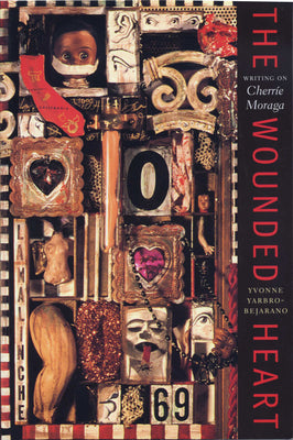 Book cover of The Wounded Heart: Writing on Cherrie Moraga by Yarbro-Bejarano, Yvonne