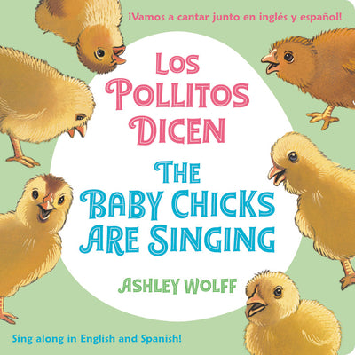 The Baby Chicks Are Singing/Los Pollitos Dicen: Sing Along In English And Spanish!/Vamos A Cantar Junto en Ingles y Espanol! by Ashley Wolff book cover