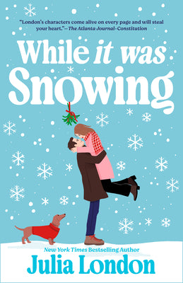 Book cover of While It Was Snowing by London, Julia